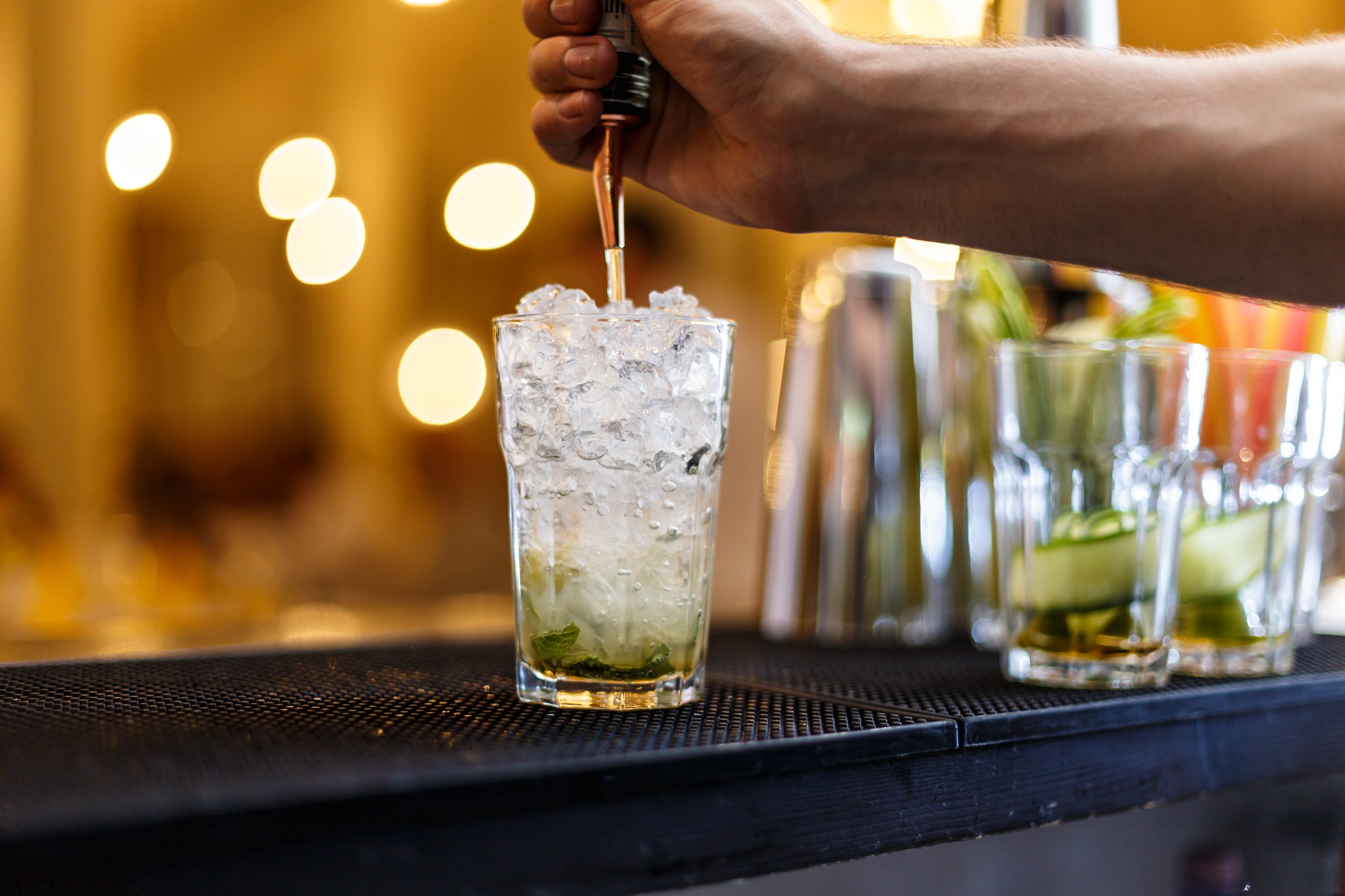 Barman making mojito
